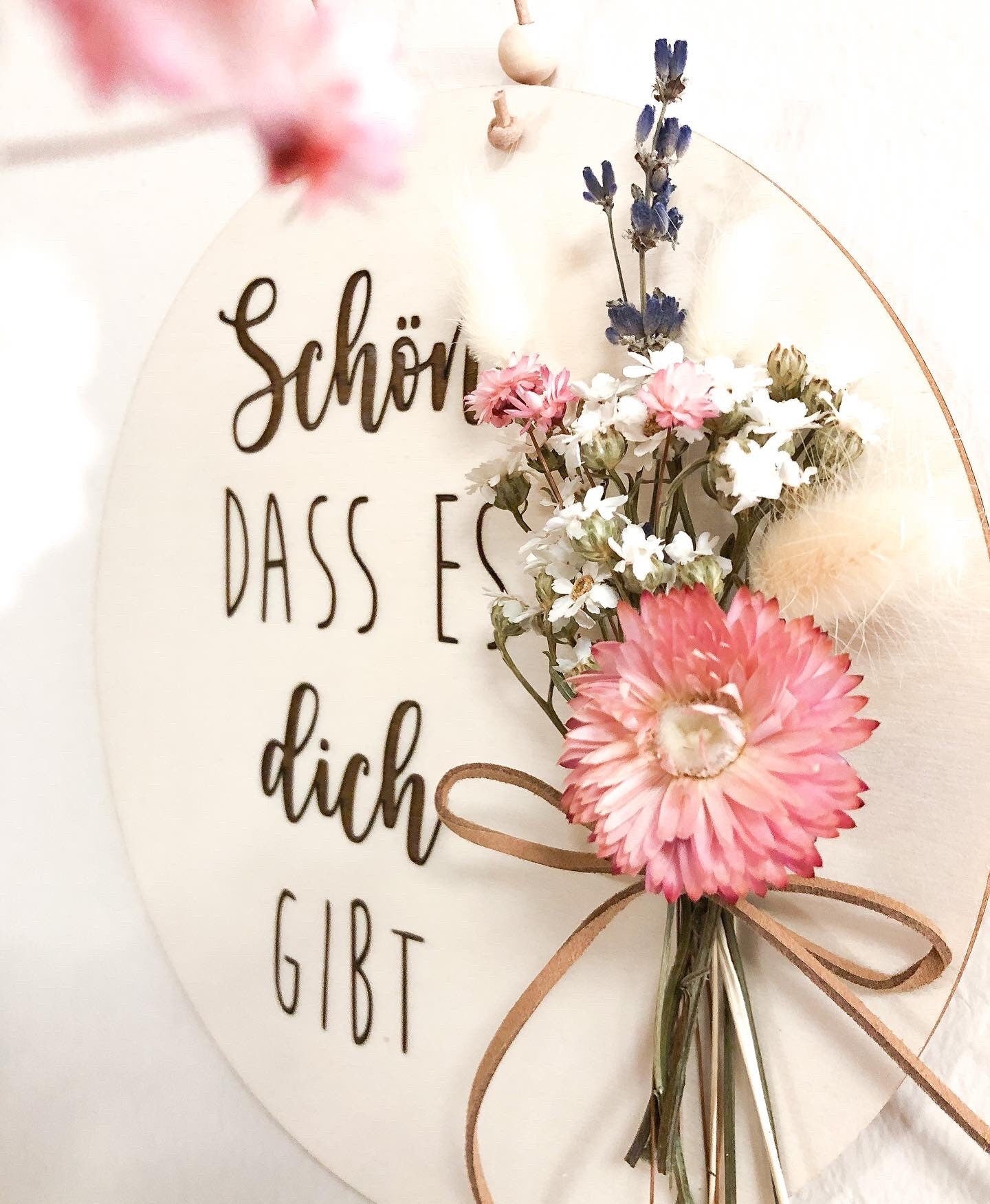 Wooden sign Nice that you exist with a bouquet of dried flowers