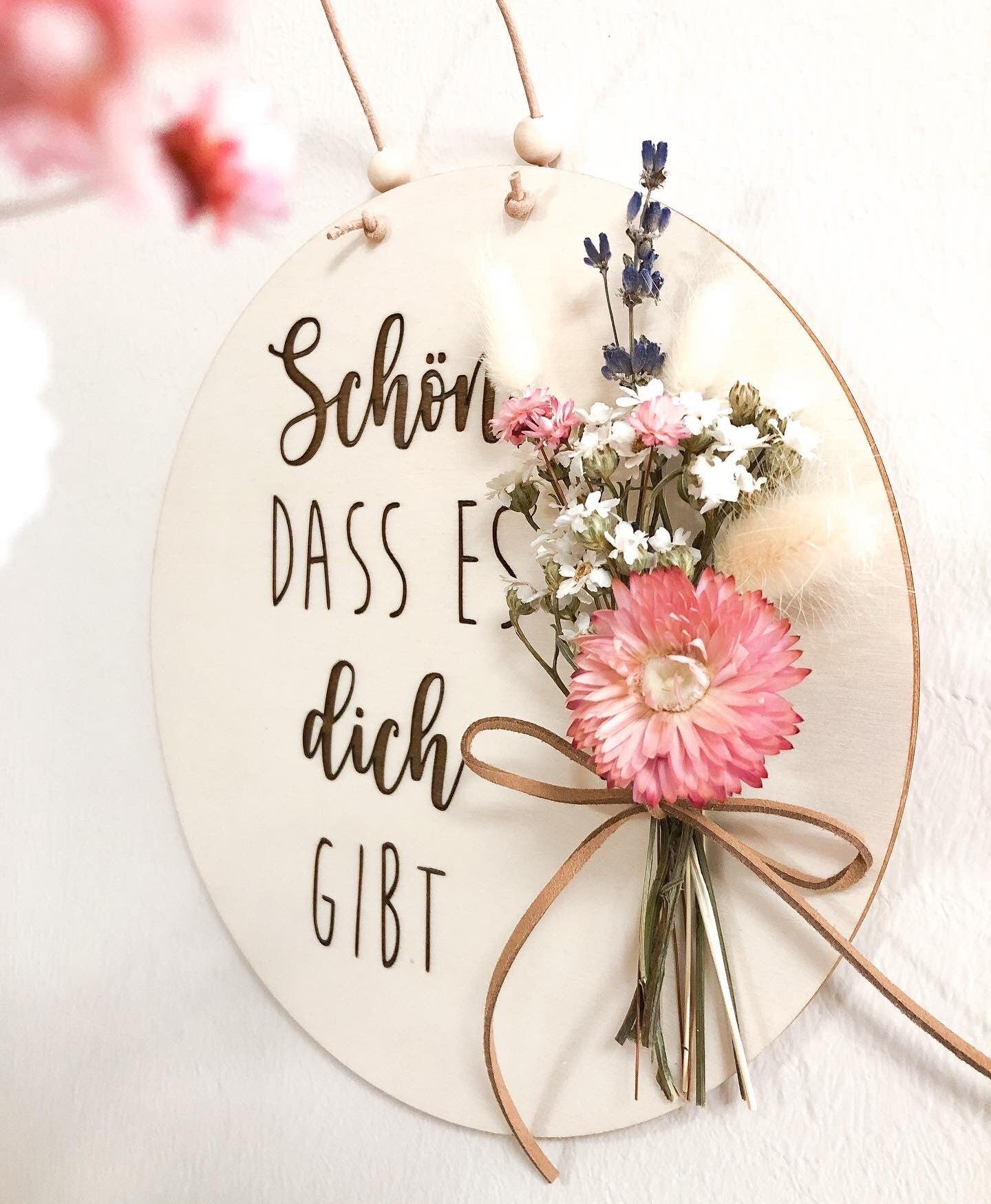 Wooden sign Nice that you exist with a bouquet of dried flowers