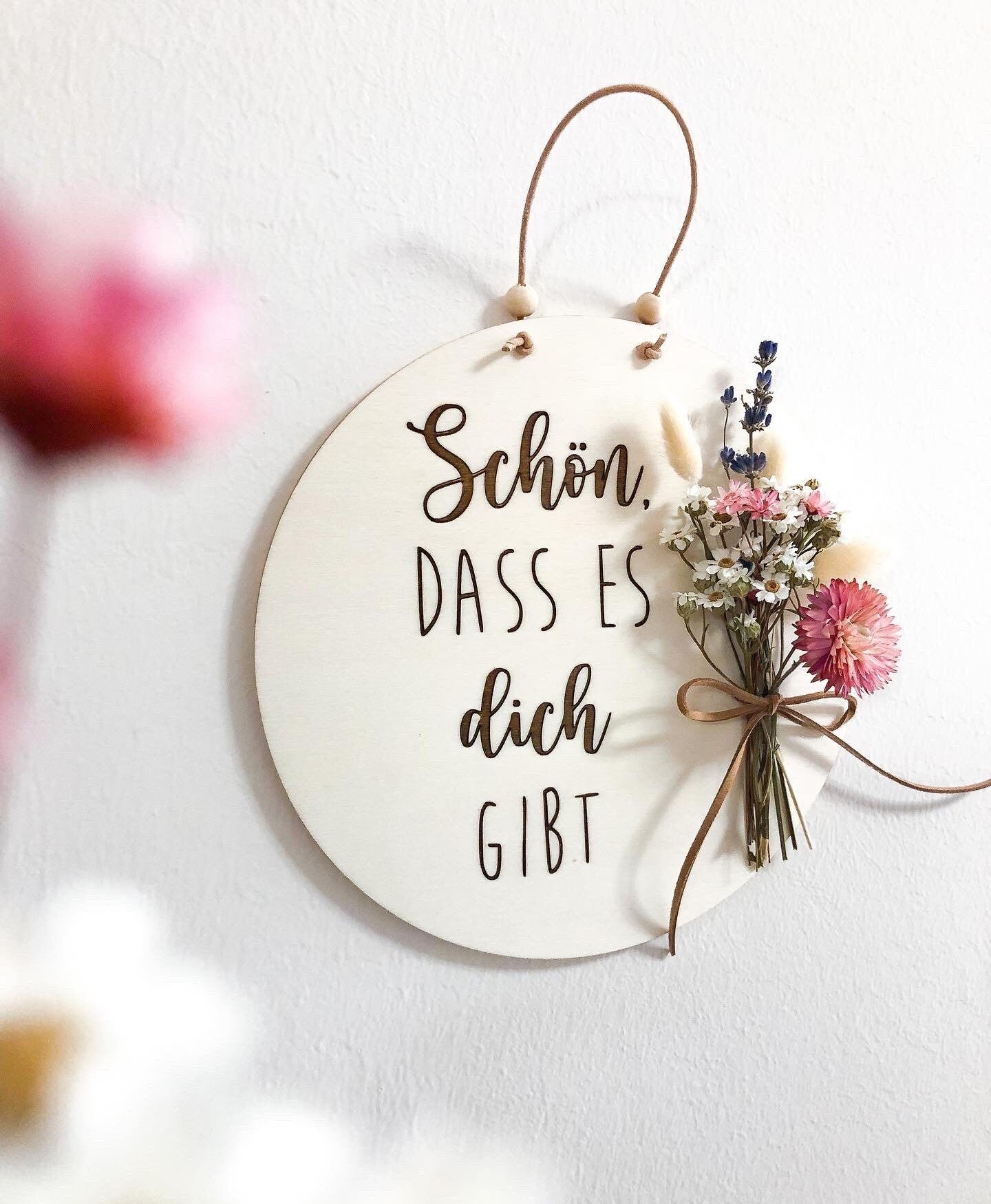 Wooden sign Nice that you exist with a bouquet of dried flowers