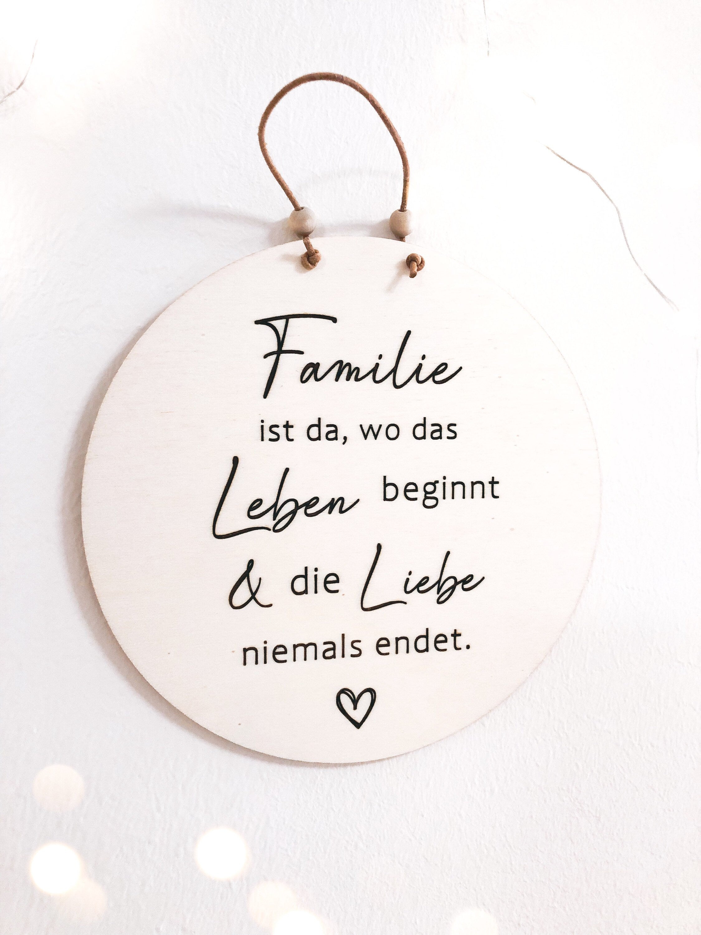 Wooden Sign Family is where life begins and love never ends.