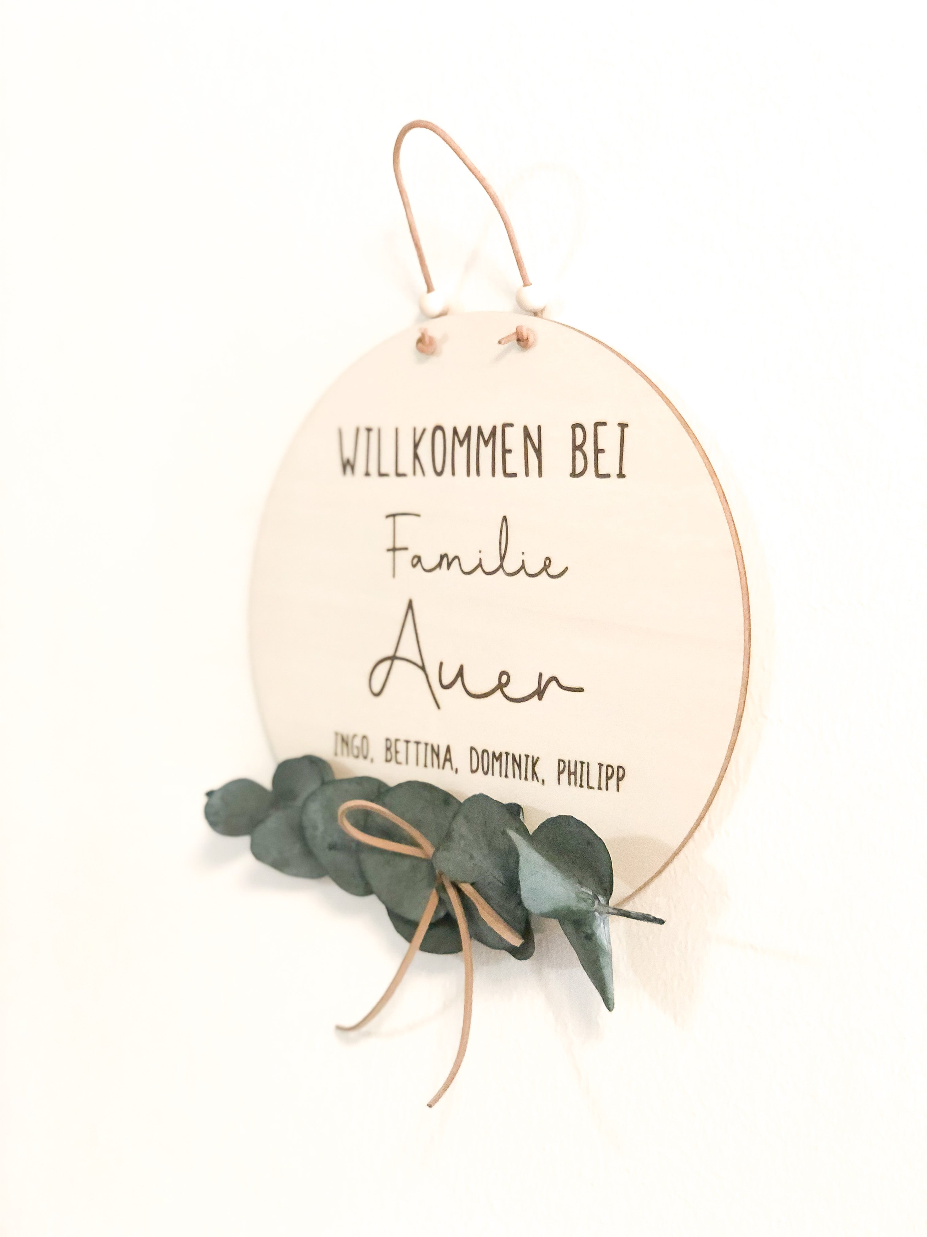 Family welcome sign personalized with dried eucalyptus